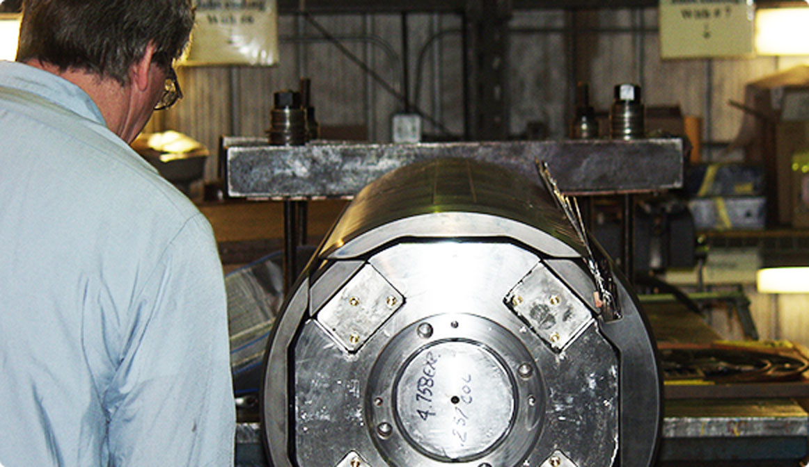 apprentice studying a mandrel